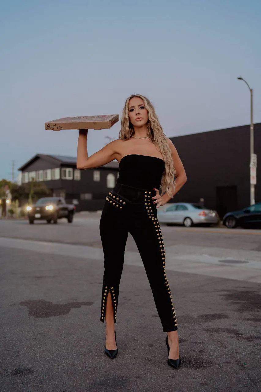 Brittany Schmitt with pizza box