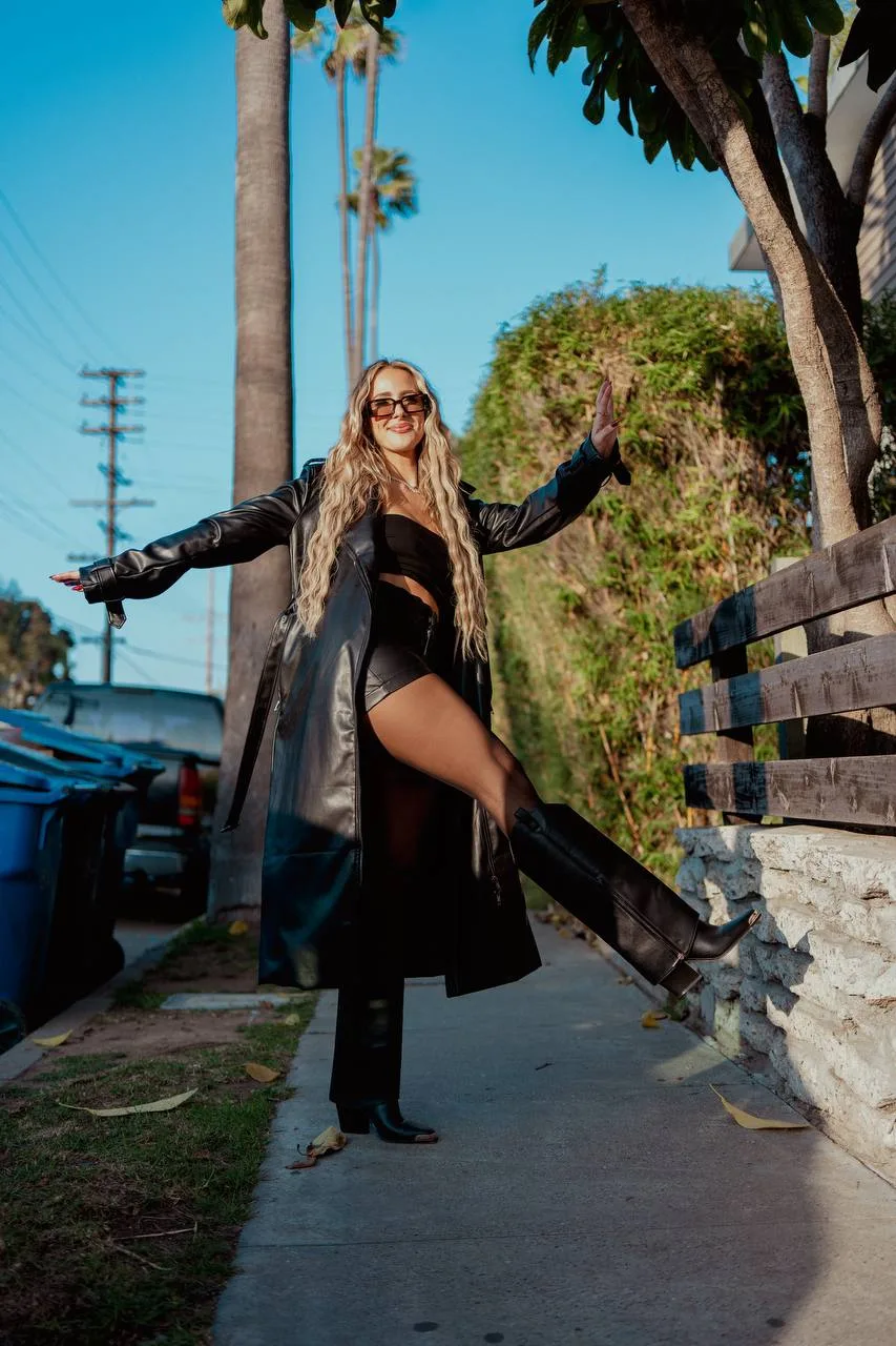 Brittany Schmitt kicking on sidewalk