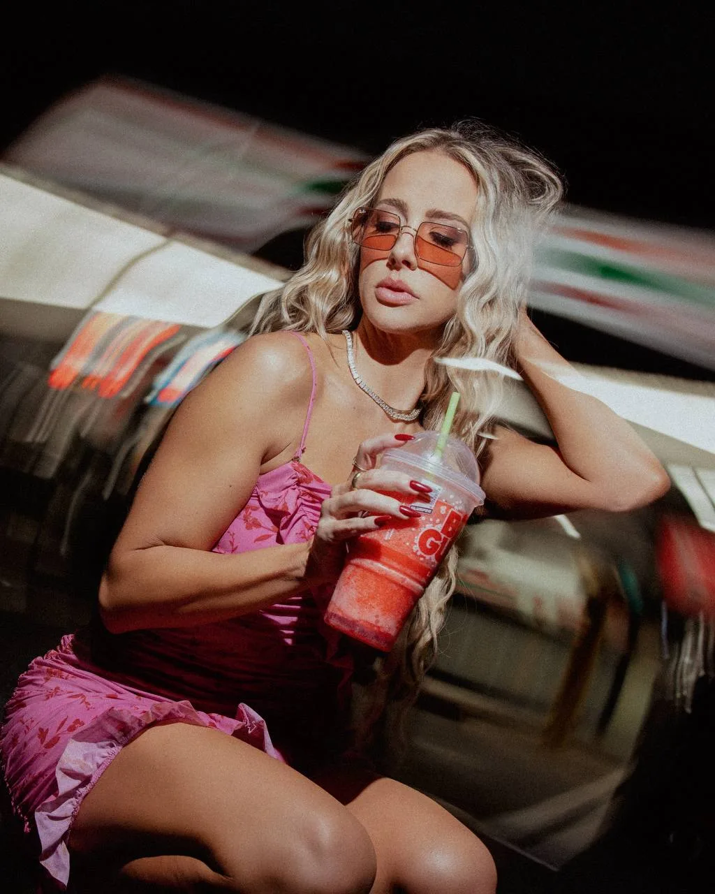 Brittany Schmitt with slushie at night